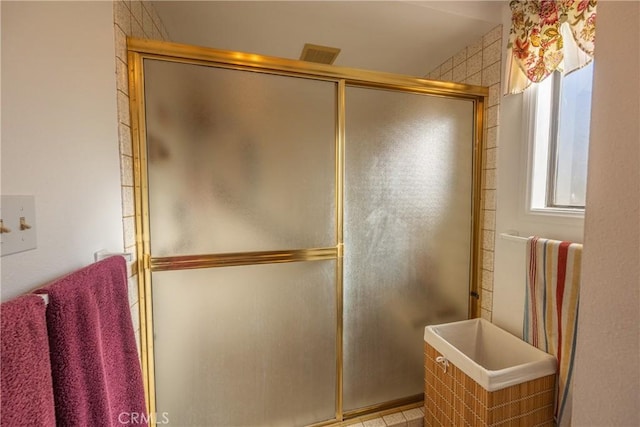 bathroom featuring walk in shower