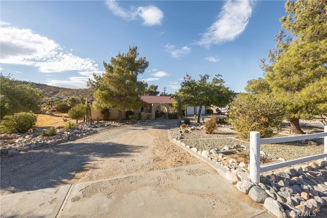 view of front of home with a mountain view