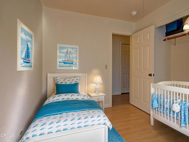 bedroom featuring light wood-type flooring