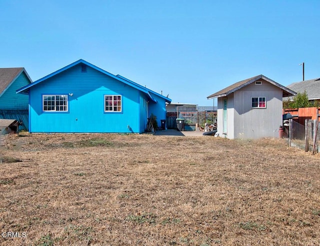 view of property exterior featuring a lawn