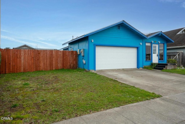 single story home featuring a garage and a front yard