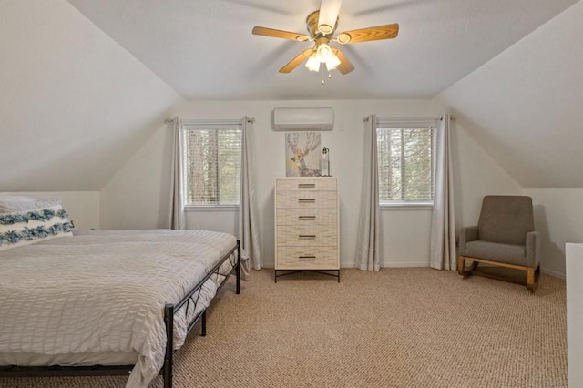 carpeted bedroom featuring ceiling fan, lofted ceiling, multiple windows, and a wall mounted AC