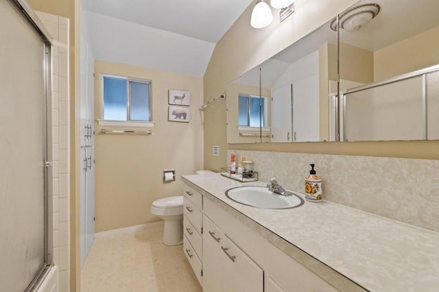 bathroom with walk in shower, toilet, vanity, and vaulted ceiling