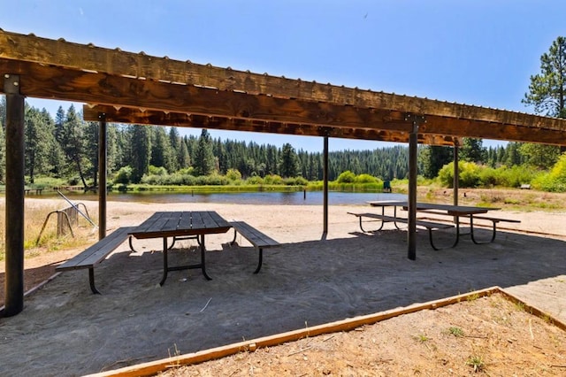 view of home's community with a water view