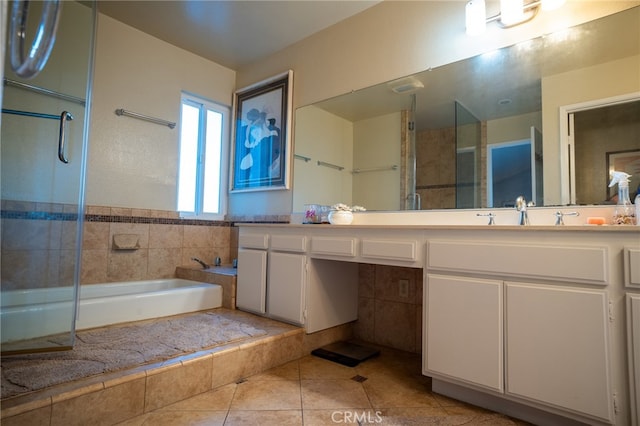 bathroom featuring tile walls, tile patterned flooring, vanity, and separate shower and tub