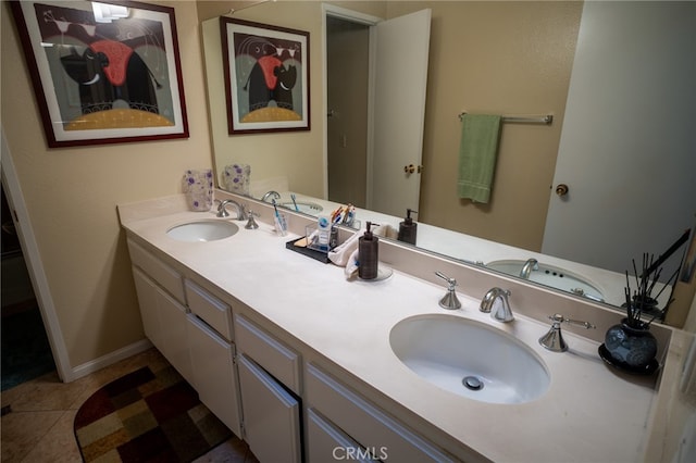 bathroom with tile patterned flooring and vanity