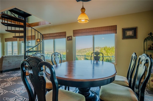 dining area with a mountain view