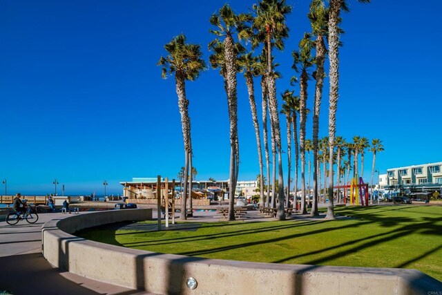 view of community featuring a lawn