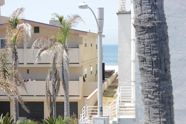 view of building exterior featuring a water view