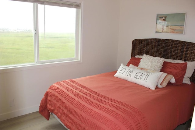 1365 Seacoast Dr Unit E, Imperial Beach, CA 91932 - bedroom with wood finished floors and baseboards