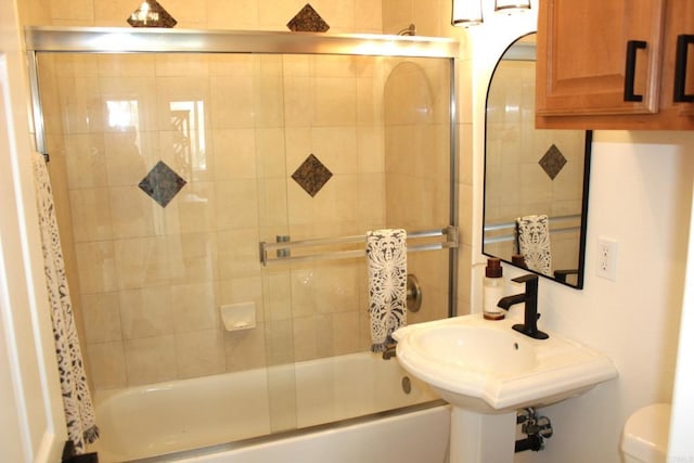 1365 Seacoast Dr Unit E, Imperial Beach, CA 91932 - full bath featuring combined bath / shower with glass door, toilet, and a sink