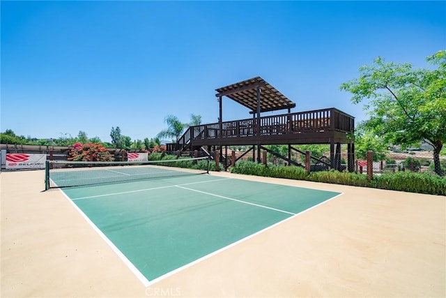 view of tennis court featuring basketball court