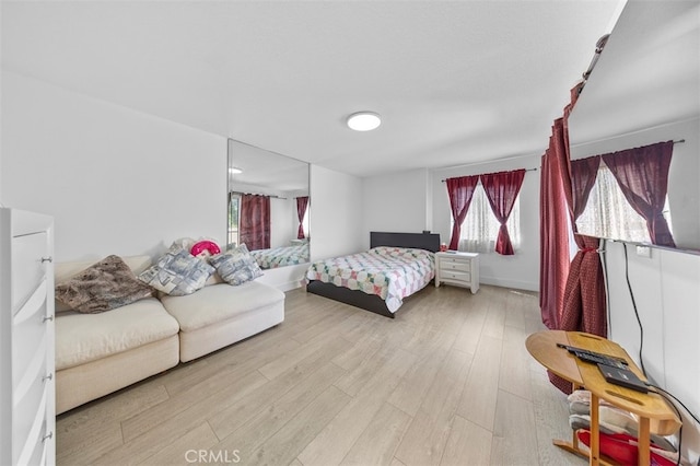 bedroom featuring hardwood / wood-style flooring