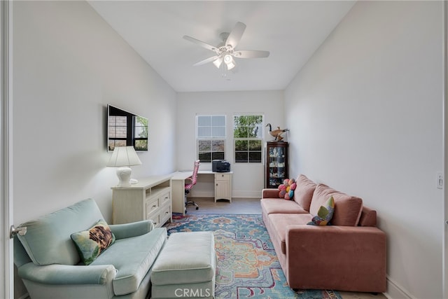 living room with ceiling fan