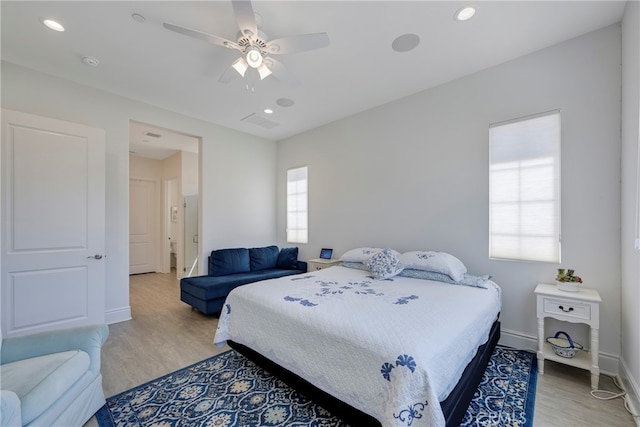 bedroom featuring ceiling fan and hardwood / wood-style flooring