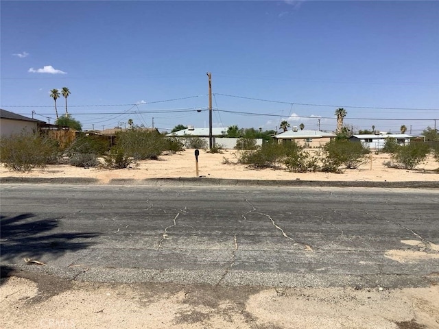 5645 Cahuilla Ave Unit 29, Palms, CA 92277 - view of asphalt street with curbs