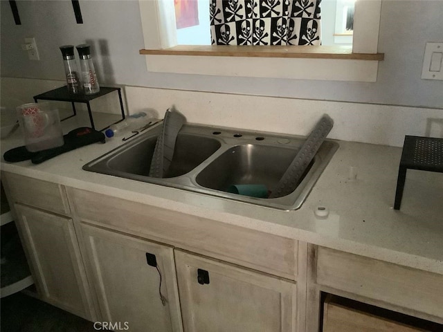 5645 Cahuilla Ave Unit 29, Palms, CA 92277 - kitchen view of a sink and light countertops