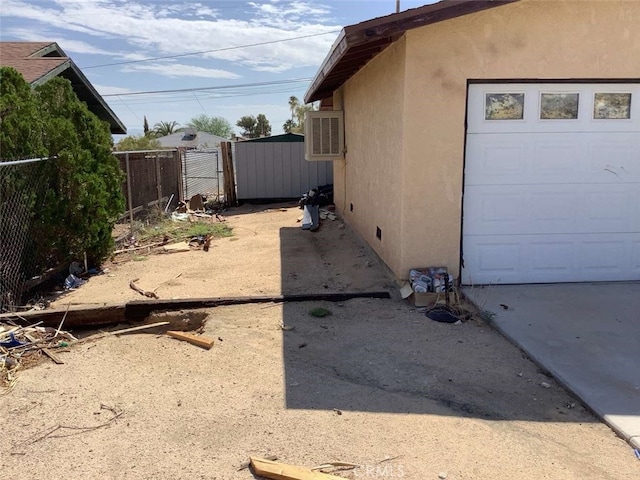 view of home's exterior featuring a garage