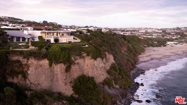 aerial view at dusk with a water view