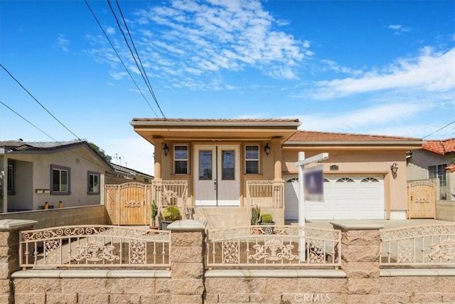 view of front of home featuring a garage