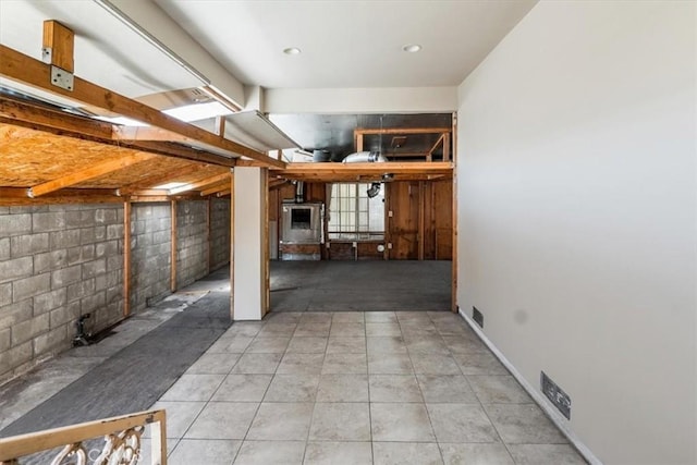 basement with tile patterned flooring