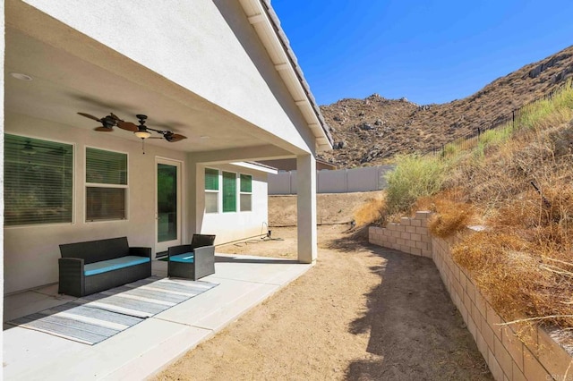 view of patio / terrace featuring outdoor lounge area and ceiling fan