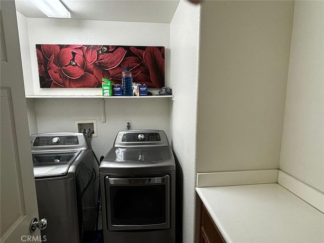 laundry room featuring independent washer and dryer