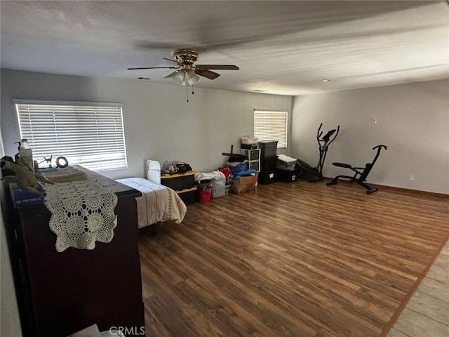 bedroom featuring hardwood / wood-style floors and ceiling fan