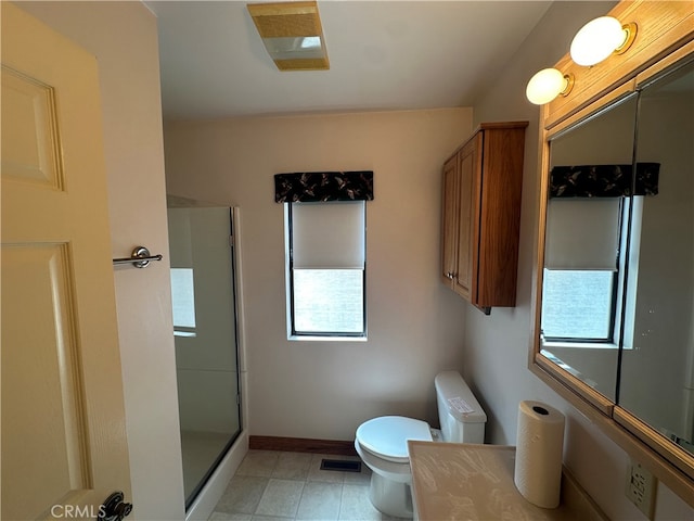 bathroom featuring walk in shower and toilet