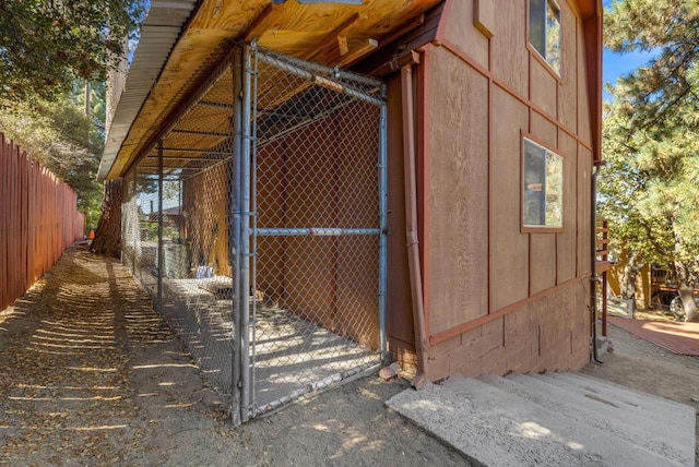 view of property exterior featuring an outdoor structure