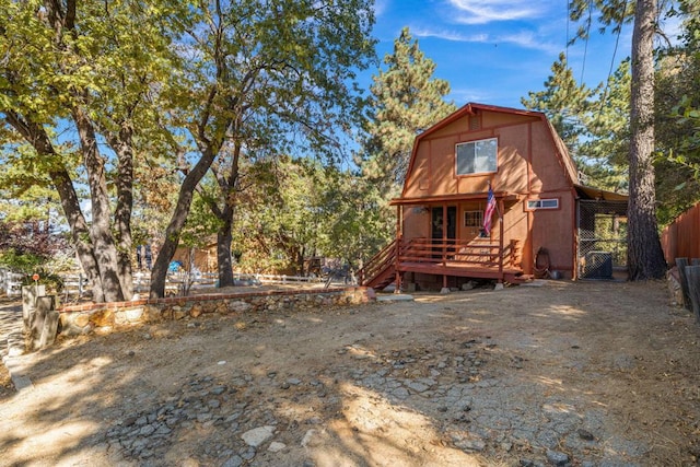 view of front of property featuring a deck