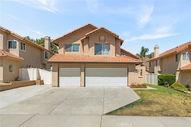 mediterranean / spanish-style home featuring a garage