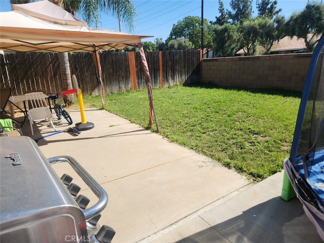 view of yard with a gazebo and a patio area