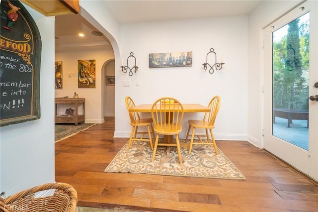 dining area featuring hardwood / wood-style flooring