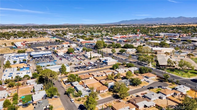 drone / aerial view featuring a mountain view