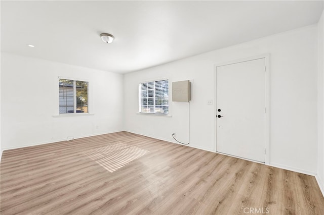 empty room with light wood-type flooring