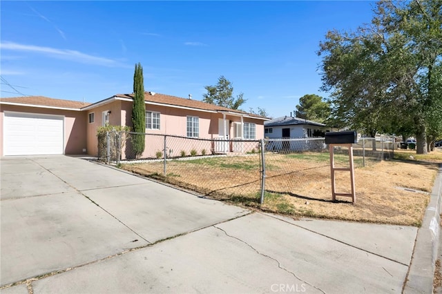 ranch-style home with a garage