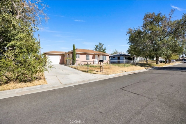 single story home with a garage