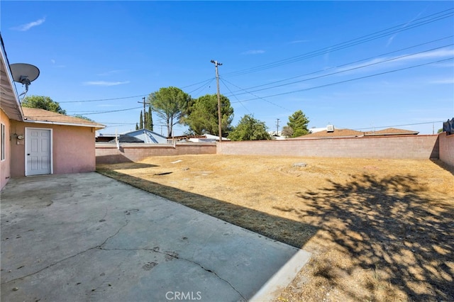 view of yard with a patio area