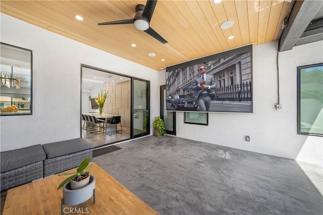 interior space featuring ceiling fan and an outdoor hangout area