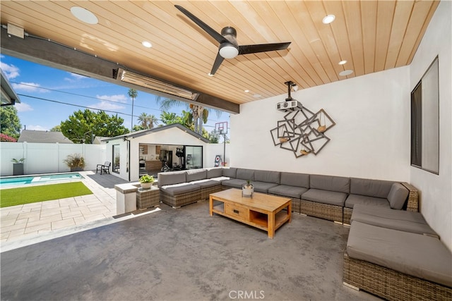 living room with wood ceiling and ceiling fan