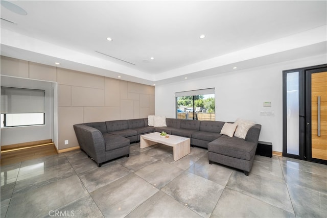 living room with concrete flooring