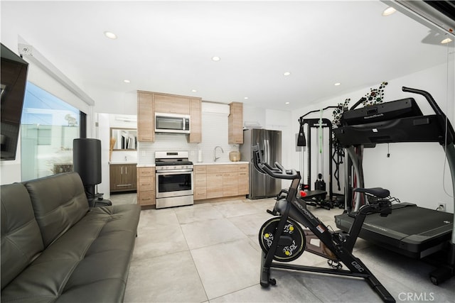 workout area featuring sink