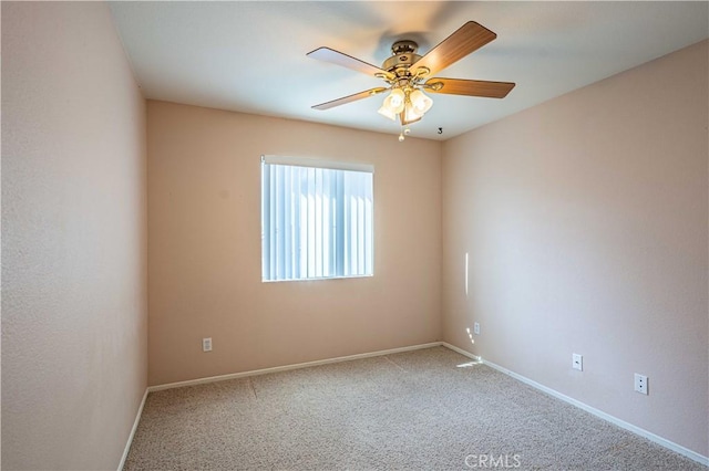 unfurnished room featuring carpet floors and ceiling fan