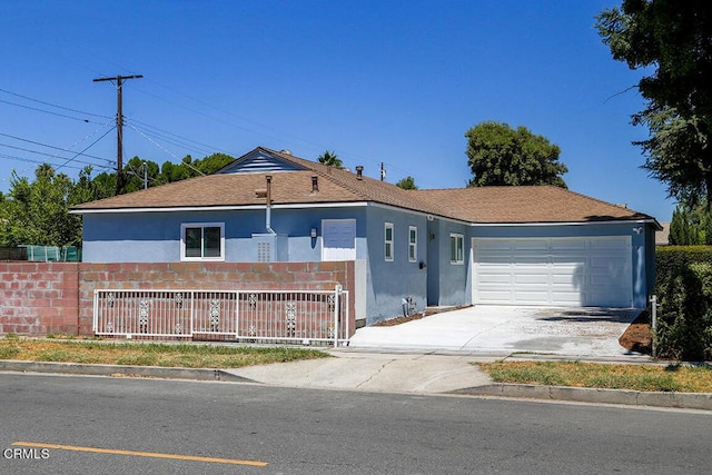 ranch-style home with a garage