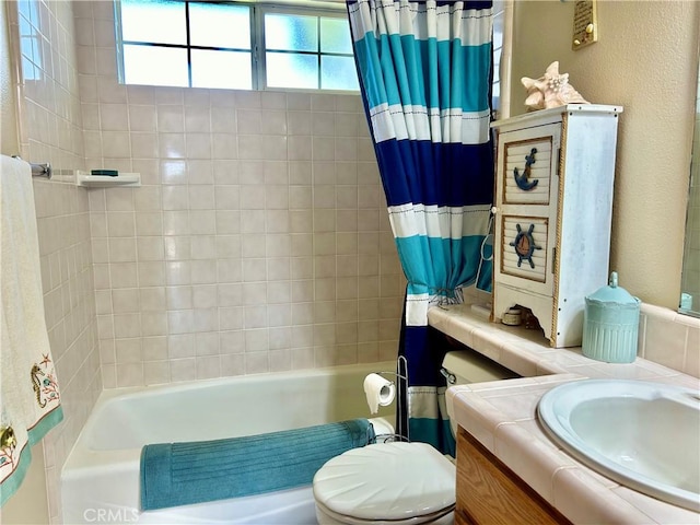 full bathroom with shower / tub combo, vanity, and toilet