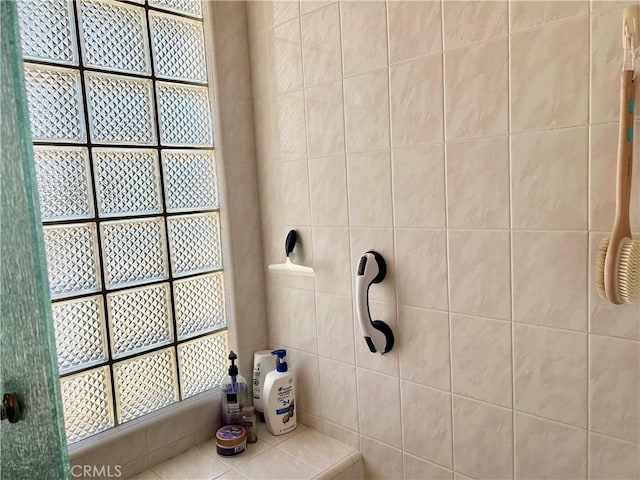 bathroom featuring a shower