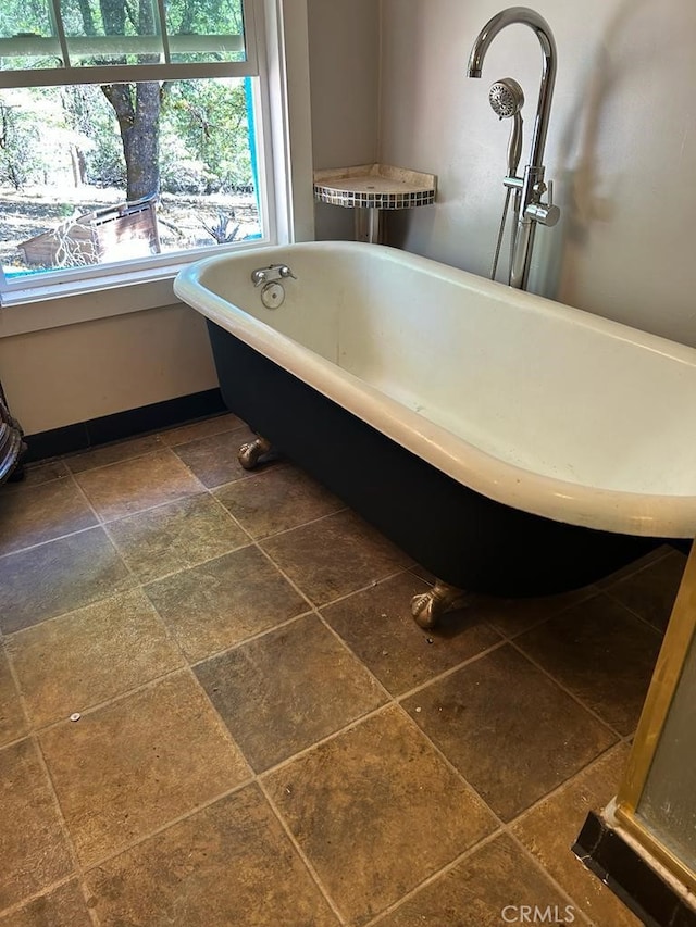 bathroom featuring a tub