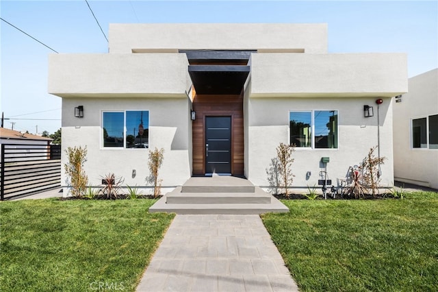 view of front of house with a front lawn