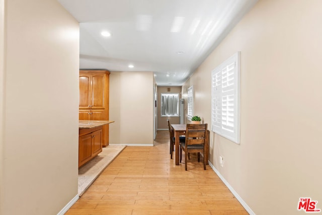 hallway featuring light hardwood / wood-style flooring